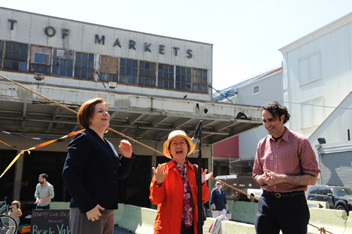 Back in 2011, Councilmember Margaret Chin, center, and City Council Speaker Christine Quinn, joined New Amsterdam Market founder  Robert LaValva, for the market's opening for the season. Downtown Express file photo by Terese Loeb Kreuzer. 