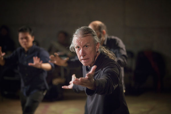 Tom Walker (foreground) with company members, in “Here We Are.”  Photo by Letizia Mariotti