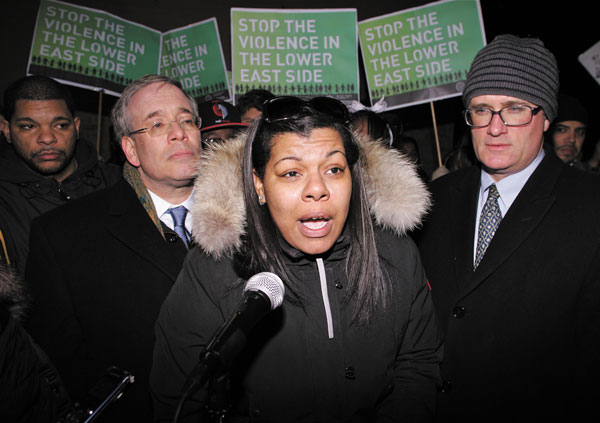 Arlene Delgado, the mother of slain L.E.S. teen Raphael Ward, spoke at the Jan. 31 unity rally, flanked by Manhattan Borough President Scott Stringer, left, and Assemblymember Brian Kavanagh.  Photos by Sam Spokony