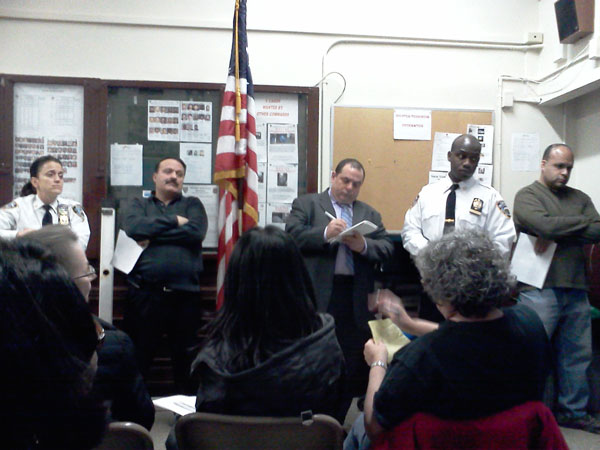 At January 31’s Community Council Meeting, Deputy Inspector Elisa Cokkinos (left) explains contributing factors to an increase in larceny crimes.  Photo by Scott Stiffler 