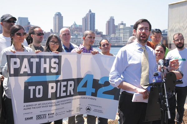 Photos by Sam Spokony With the waterfront at his back, state Senator Daniel Squadron, with community leaders and collaborators, announced the interim opening of Pier 42 for public use on Saturday.