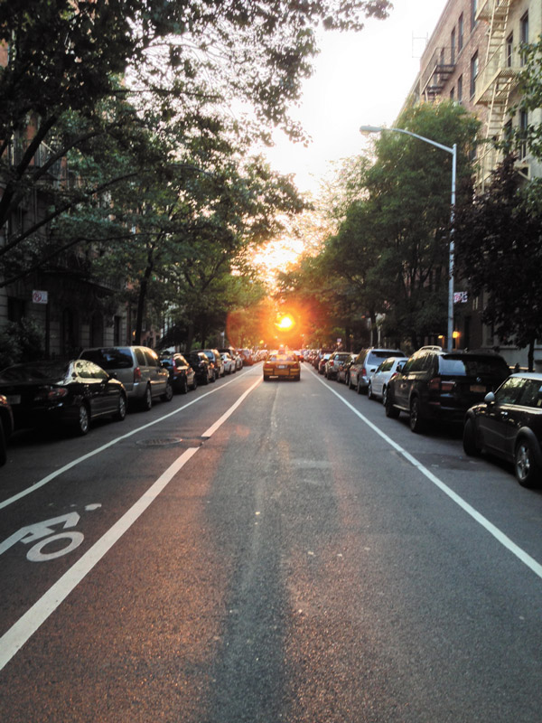 Whether it’s finding a soul mate or winning the lottery, you can wait your whole life for the stars to align. But once in a blue moon, our favorite mass of incandescent gas falls into perfect alignment with the buildings of West Chelsea — as it did this past Saturday, June 8. That’s when our freelance shutterbug Pamela Wolff captured this fleeting 21st Street phenomenon (which is not to be confused with July 12’s upcoming, midtown-friendly Manhattanhenge). Wolff has taken to calling this hyperlocal June version “Chelseahenge” — and as chair of the Community Board 4 Landmarks Committee, that moniker just might stick!   Photo by Pamela Wolff Chelseahenge! 