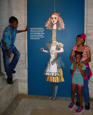 Photo by Lynn Ramsey Tony, Elizabeth and Sky (with Alice), during the Fulton Youth Reading Circle’s recent trip to “The ABC of It: Why Children’s Books Matter” (an exhibit on display at the 42nd St. New York Public Library, through March 23, 2014).