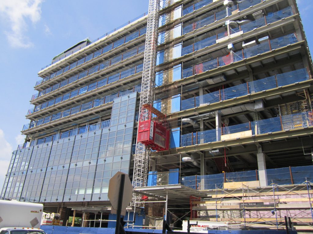 The exterior glass facade is currently being installed on the Spring St. mega-garage.  Photos by Lincoln Anderson