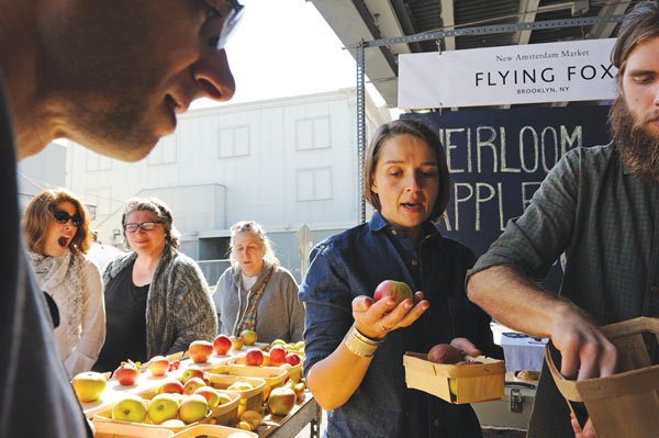 Downtown Express photos by Terese Loeb Kreuzer Maggie Nesciur, the owner of Flying Fox, brought her hand-picked fruit to New Amsterdam Market on Sept. 29.