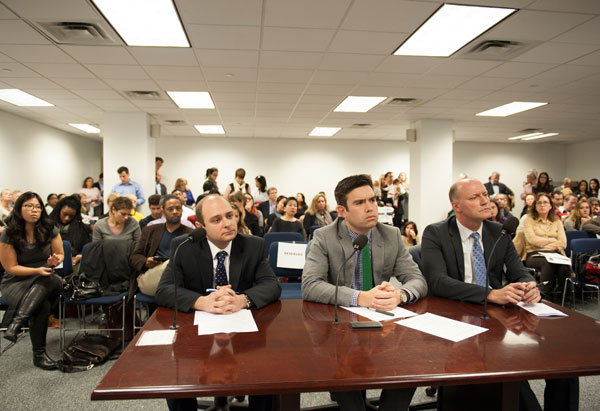 A hearing room at 250 Broadway was packed on Nov. 6 with people who objected to the City's plan to move part of the Probation Department from 346 Broadway to 66 John St. — a growing residential neighborhood with schools, childcare facilities and a Pace University dormitory. Matthew Berk, executive director of Citywide Real Estate, Ryan Dodge of the Department of Probation and Laurence Busching, first deputy criminal justice coordinator in the Mayor's Office, defended the plan. (Photo: Terese Loeb Kreuzer)