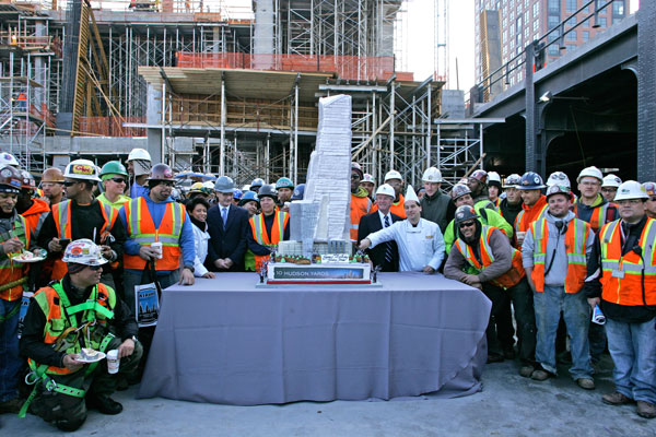 Photos by Sam Spokony Hudson Yards construction workers joined executives from Related and Fairway Market around the cake modeled after 10 Hudson Yards.