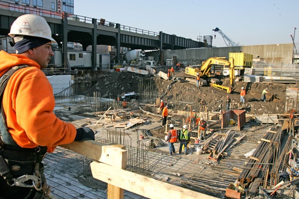 Work on the Hudson Yards site is taking place while the final section of the High Line, seen here at back left, is also undergoing construction.