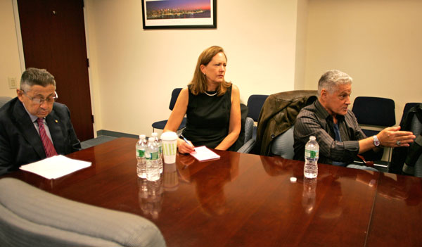 Downtown Express photo by Sam Spokony Community Board 1’s Paul Hovitz, right, makes his point to Dept. of Education officials Tuesday. To the left are Assembly Speaker Sheldon Silver and Catherine McVay Hughes, the board’s chairperson.