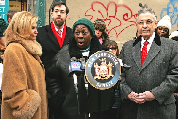 Gouverneur Gardens resident Irene Alladice, flanked by Congressmember Carolyn Maloney, State Senator Daniel Squadron and Assembly Speaker Sheldon Silver, urged the M.T.A. to finally finish its work on the E. Broadway subway escalator. DowntownExpress photo by SamSpokony