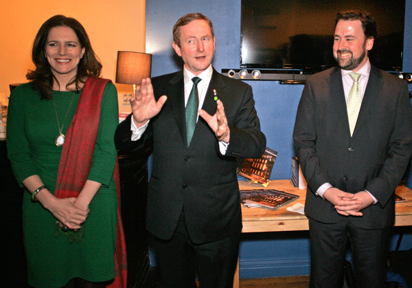 Irish Prime Minister Enda Kenny, center, spoke at the soon-to-be-expanded Irish Arts Center on March 17, flanked by IAC Executive Director Aidan Connolly, right and IAC Vice Chair Pauline Turley.   Photo by Sam Spokony