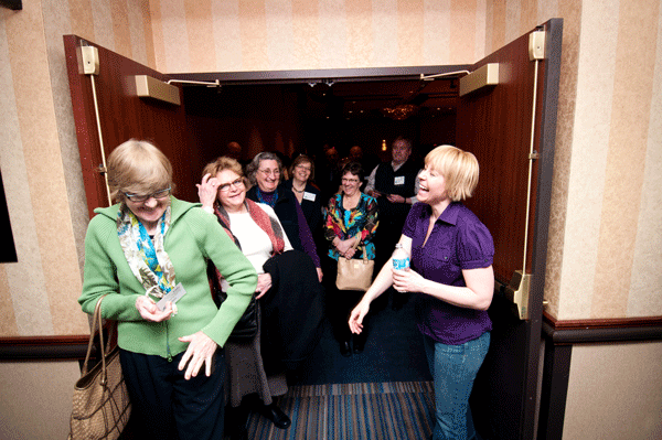 Photo courtesy of the artist Taren Sterry (at right) greets hospice nurses and audience members, following a Dec. 2013 performance of “180 Days.”