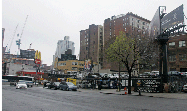 Photo by Sam Spokony The corner of 10th Ave. & W. 34th St. could see the construction of America’s tallest office tower, which would sit just north of the Hudson Yards project (whose cranes are visible at left).  