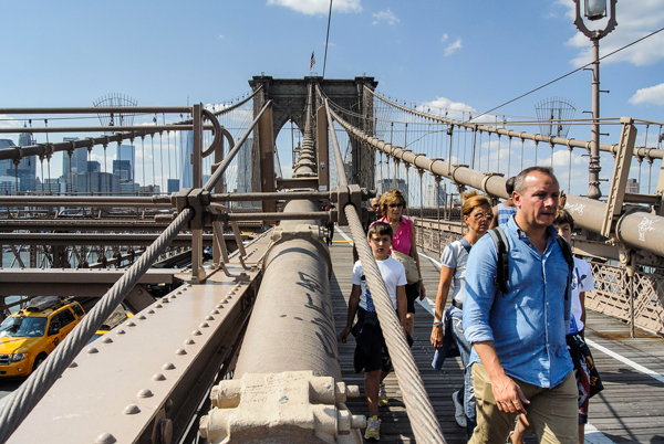 Photo by Stefano Giovannini  A gate is the only thing keeping thrill-seekers from walking up the Brooklyn Bridge cables to the top of the iconic span, as a Russian tourist did on Sunday.