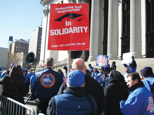 Photo by Dusica Sue Malesevic Members of othear unions, including the Screen Actors Guild, came to show solidarity with the postal workers. 