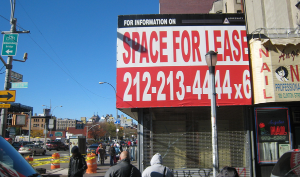 Advertising for a corner storefront on Clinton St., where commercial vacancies are at 20 percent.  Photo by Lesley Sussman