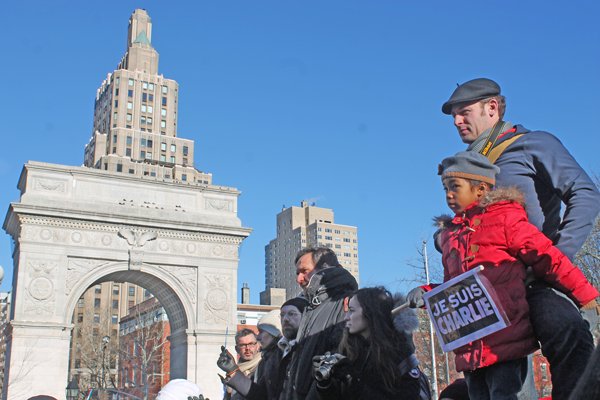 Downtown Express photos by Zach Williams Crowds came to Washington Square Park Saturday in support of the French people and Charlie Hebdo magazine, which was attacked by Islamic extremist terrorists Jan. 7, when 12 people were killed by gunmen.