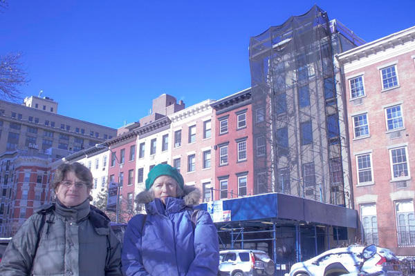 Photo by Zach Williams L to R: Preservationists Fran Luskin and Julie Finch stand in front of Hopper-Gibbons House, whose fifth floor addition has been the topic of a long court battle. 