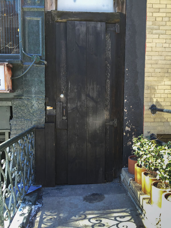 The door to an alley on Thompson St. where Hernandez alleges he dumped Etan Patz’s body.  Photo by Tequila Minsky