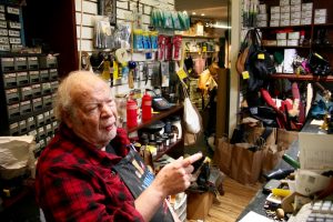 Photo by Yannic Rack Minas Polychronakis complains that customers can’t reach his FiDi shoe repair shop whenever film sets clog the area.
