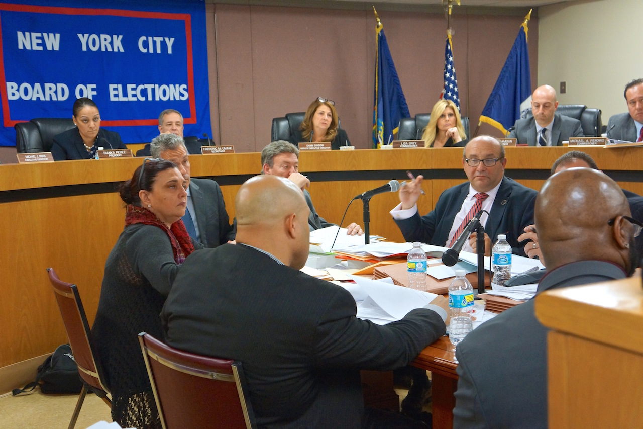 Responding to pissed-off voters who packed the May 3 city Board of Elections hearing, board President Bianka Perez, top left, insisted the “proper procedure for counting affidavits” had been followed. Photo by Sarah Ferguson