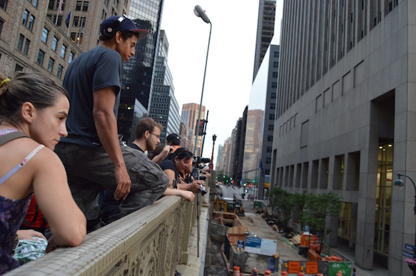 Photographers, seen here in May trying to capture Manhattanhenge on the Vanderbilt Viaduct over 42nd Street at Grand Central Terminal, were shooed away from the bridge this week. | JACKSON CHEN