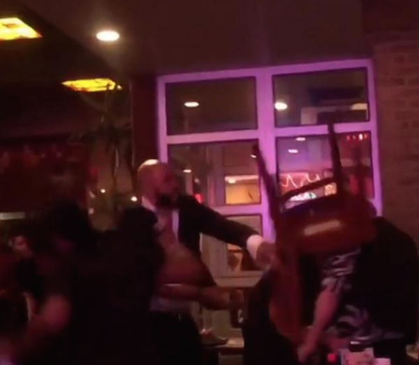 A screen grab from video that circulated immediately after the Dallas BBQ incident last May showing Bayna-Lekheim El-Amin bringing a chair down over Ethan York-Adams’ head. Image by Isaam Sharef, via YouTube.com