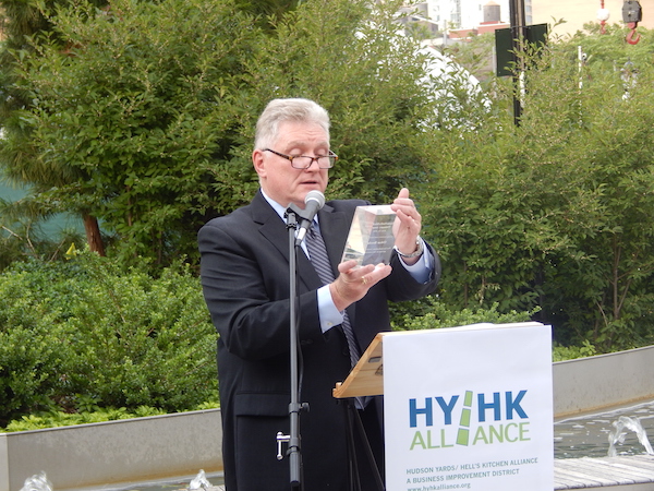 Alliance Chair Kevin Singleton presents the group’s Visionary Award to Oskar Brecher posthumously, after the BID member’s April passing. Photo by Sean Egan.