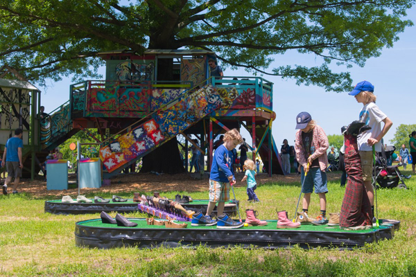 Photo by Anthony Collins A quirky, artist-designed miniature golf course — plus the whimsical treehouse in the background — will be featured attractions at the Figment NYC festival this weekend, but will remain open on Governors Island all summer.