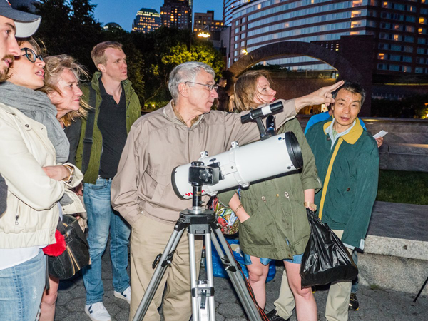 Photo by Milo Hess Joe Delfausse, a leader of the Amateur Astronomers Association of New York, promotes the joy of stargazing by setting up his telescope in public spaces and inviting passers-by to get a close-up look at the heavens.