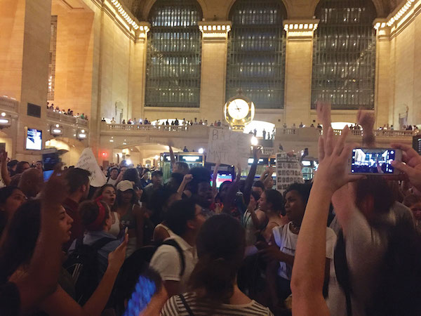 Inside Grand Central, protestors gathered under the clock tower before holding a moment of silence for victims of police shootings. Photo by Lauren Vespoli.