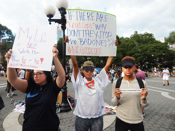 Protesters created these signs in Union Square, on the evening of Sun., July 10. Photo by Jane Argodale.