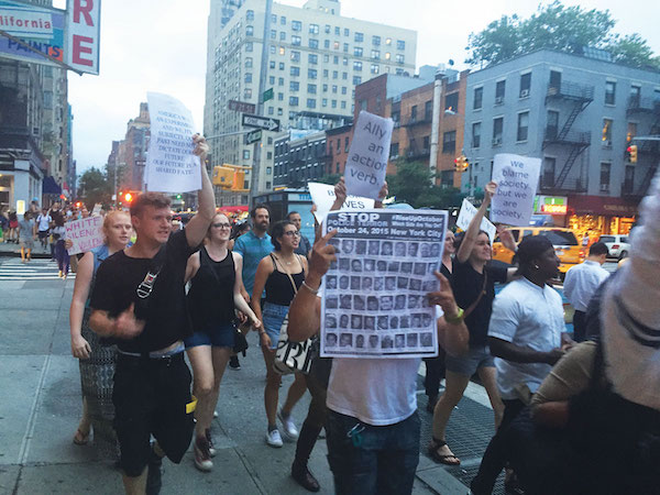 Black Lives matter protestors marched up Seventh Ave. in Chelsea on Friday evening. Photo by Lauren Vespoli.