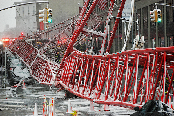 The falling crane killed one person and crushed several cars parked along Worth St. on Feb. 5, prompting new regulations from the city. Photo by Milo Hess.