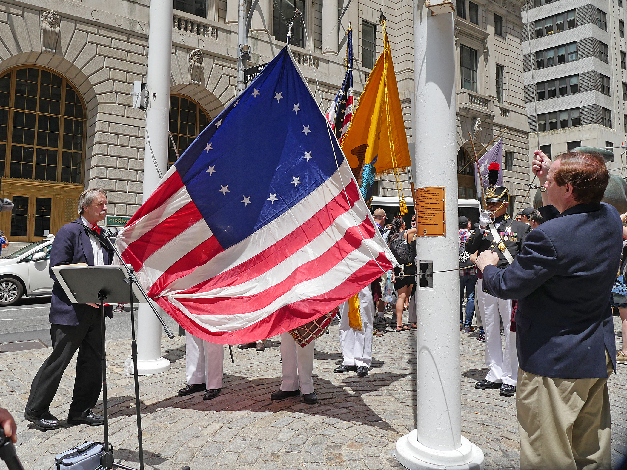 Photo by Milo Hess The parade culminated in a flag-raising ceremony at Bowling Green, the nation's first public park.