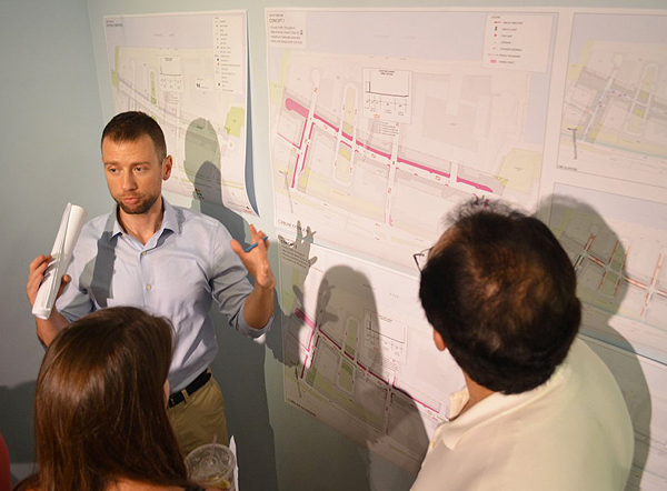 Photo by Alex Ellefson Stantec landscape architect Mike Russel explains the three design concepts for South End Ave. to Battery Park City residents at the July 25 open house.