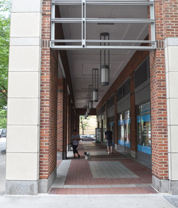 Photo by Alex Ellefson The Battery Park City Authority is mulling an overhaul of South End Ave. that may involve eliminating pedestrian arcades like this one at the southeast corner of South End Ave. and West Thames St.