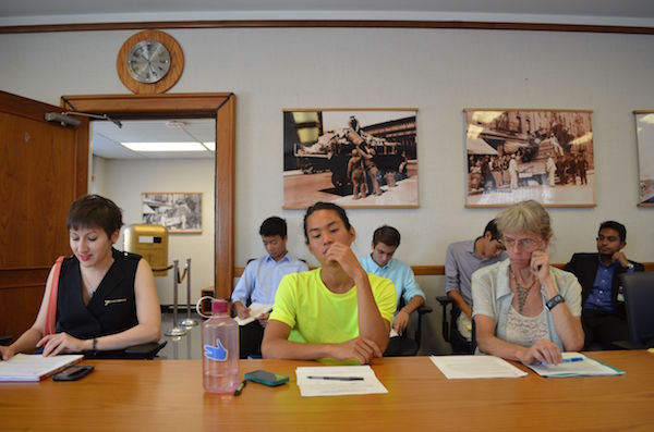 L to R: Julia Kite, policy and research manager for Transportation Alternatives; Pio Tsai, a student involved in the NYU bike share program; and Karen Overton, executive director for Recycle-A-Bicycle, at the DSNY hearing about reforming criteria for derelict bikes. Photo by Alex Ellefson.