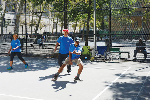 It’s game on for members of the St. Albans Handball Association (sahany.org), after the Aug. 23 ribbon-cutting for Chelsea Park’s refurbished courts. Photo by Malcolm Pinckney, courtesy NYC Parks.