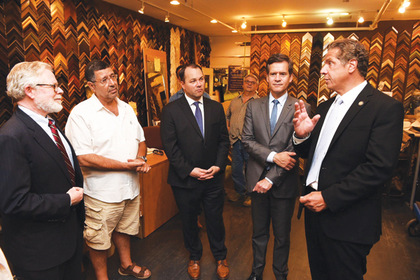 Local electeds visit King David Gallery on Sept. 21. L to R: State Assemblymember Richard Gottfried, gallery owner Daniel Peretz, Councilman Corey Johnson, State Senator Brad Hoylman, Governor Andrew Cuomo. Photo courtesy Office of Governor Andrew Cuomo.