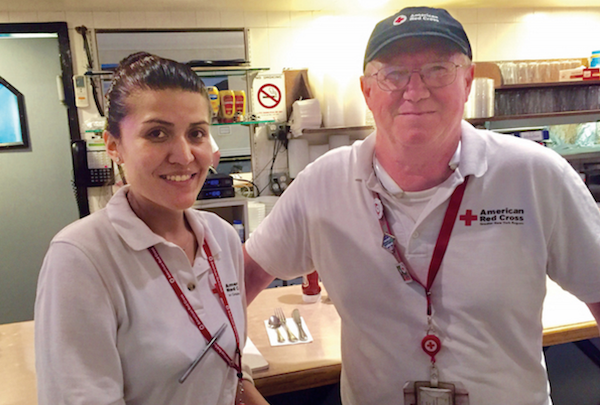 Lorena Velastegui and Paul Allwright are among the 50 Red Cross volunteers serving the needs of the Chelsea community following Saturday evening’s West 23rd Street explosion. | EILEEN STUKANE 