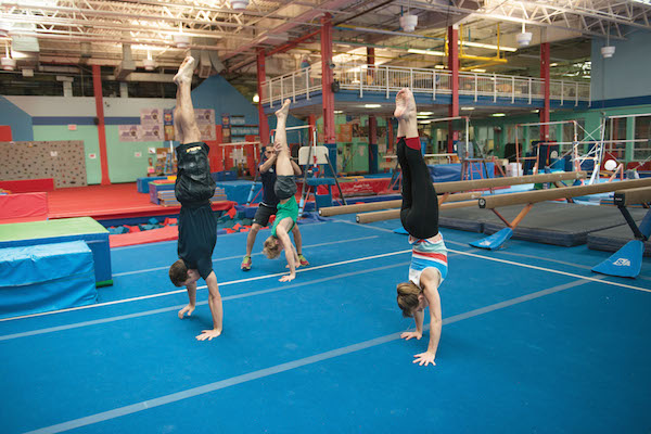 Joey Garcia, an instructor at Chelsea Piers, ad an adult class with three students. Photo by Scott McDermott.