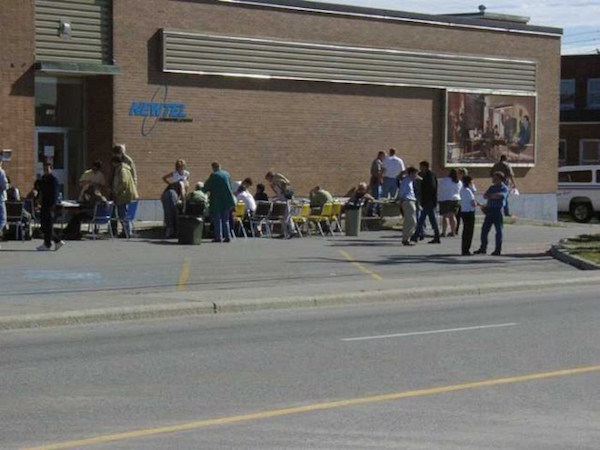 The local telephone company, NewTel Communications, set up phone lines in their parking lot for passengers. Photo courtesy Town of Gander.