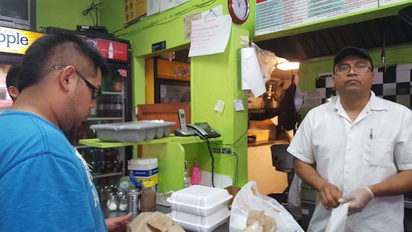 Maximo Garcia has owned Great Burrito (100 W. 23rd St.) for 15 years. It reopened on Tuesday. Photo by Dusica Sue Malesevic.