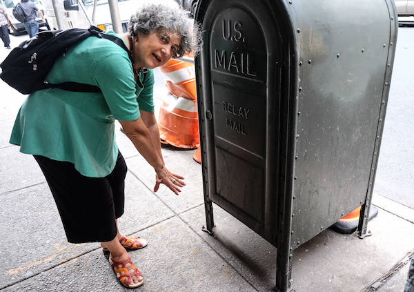 Jane Schreibman shows the spot where she saw the bomb. Photo by Tequila Minsky.