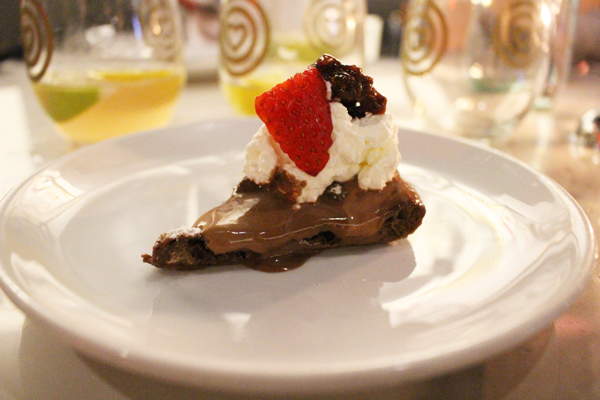 Photo by Yeonji Wu The desert pizza, “Henriette,” tops a zeppole crust with Jacques Torres chocolate ice cream, berries, cream, and chocolate drizzle.