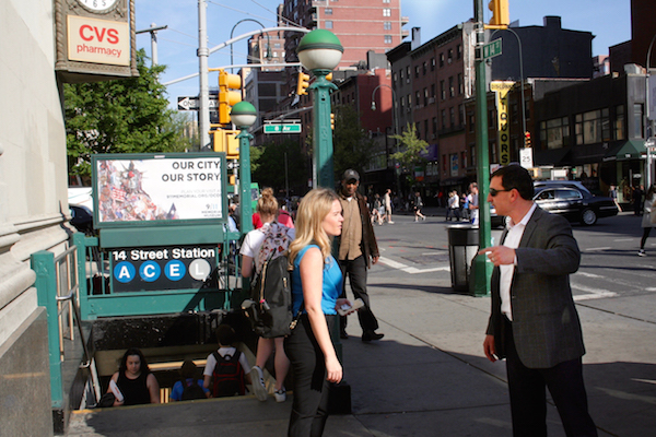 The Canarsie Line currently serves 50,000 daily riders in Manhattan alone, according to the MTA. Seen here, straphangers at the entrance to the Eighth Ave. L train stop on W. 14th St. Chelsea Now file photo by Yannic Rack.