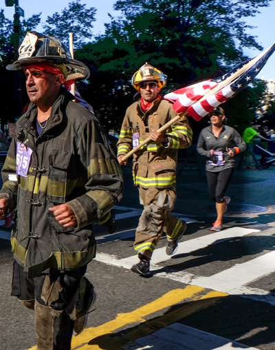 Photo by Tequila Minsky Many firefighters wore their gear for the run, which retraces the steps of firefighter Stephen Siller, whose legendary dash though the Brooklyn-Battery Tunnel Sept. 11, 2001 — in full gear — to the burning Twin Towers, where he died saving civilians.