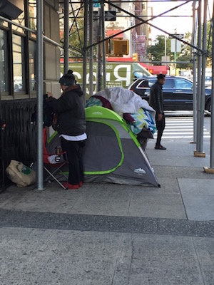 Midtown South residents are seeking to clear homeless encampments, such as this one at W. 30th St. near Eighth Ave., by helping those who live there. Photo by Barbara Rosenwach.