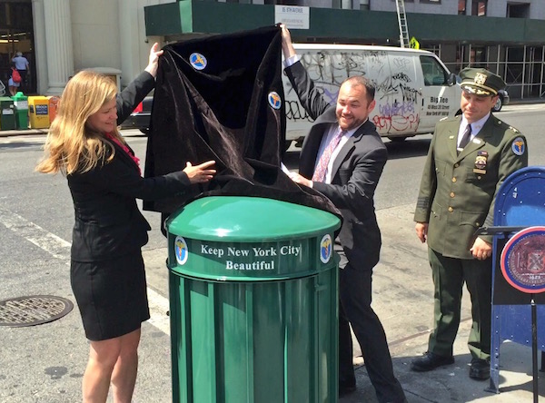 May 2015: Sanitation Commissioner Kathryn Garcia and Councilmember Corey Johnson unveiled a new “big belly”-style trash can at W. 14th St. and Eighth Ave. Photo courtesy Office of Councilmember Corey Johnson.